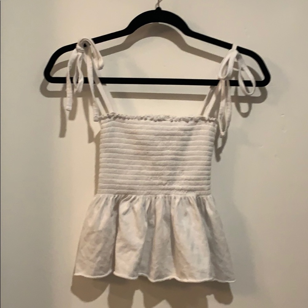 White flows and rubbed shirt